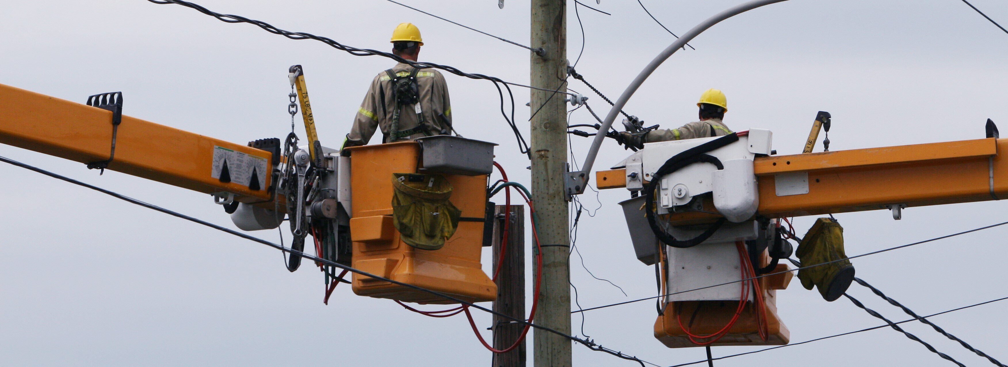 Powerline workers fixing lines during an outage